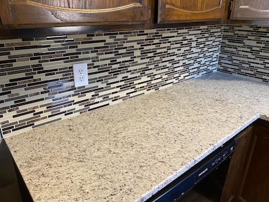 New Glass Tile + Granite Countertops