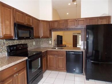 REMODELED KITCHEN WITH GRANITE COUNTERS*HIGH CEILI