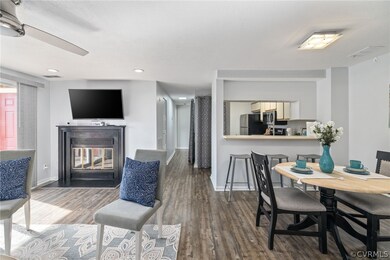 Dining area with dark hardwood / wood-style floors