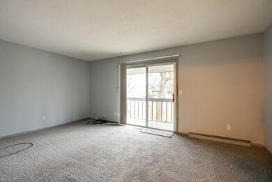 Living room with sliders out to deck