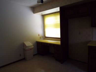 Built in desk area in Kitchen, and room for a brea