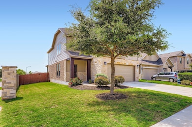 View of front of property featuring concrete driv