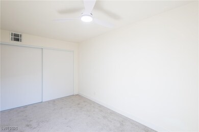 Unfurnished bedroom with carpet floors, a closet,