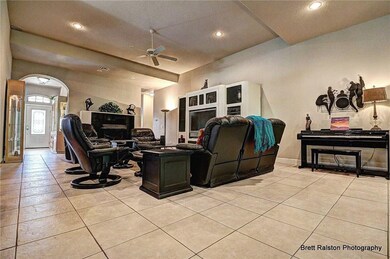 View of family room towards fireplace and foyer