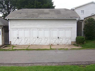 Exterior Front. 3 stall garage