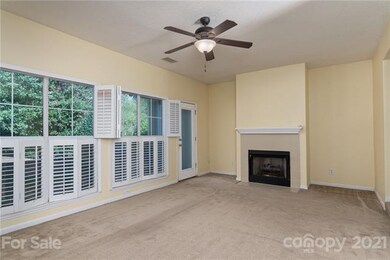 Large living space with TONS of natural light over