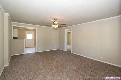 Living room looking into dining room.