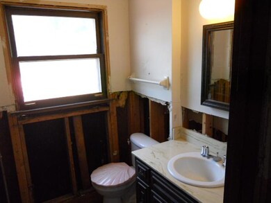 Half bath located off kitchen