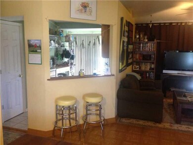 Exterior Front. Kitchen has access  to back deck. Snack bar provides easy serving for quests.