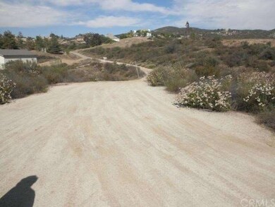 Via De Oro, dirt road to subject property.