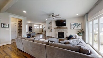 The family room with recessed lighting, gas firepl