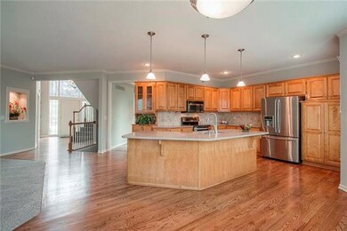 Refinished wood floor, silestone counter, stainles