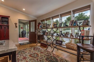 A wall of newly installed windows lets in lots of 