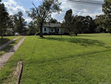 Front of Home Standing close to Hwy