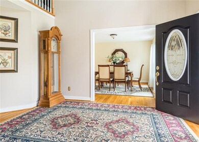 Large foyer with atrium ceiling
