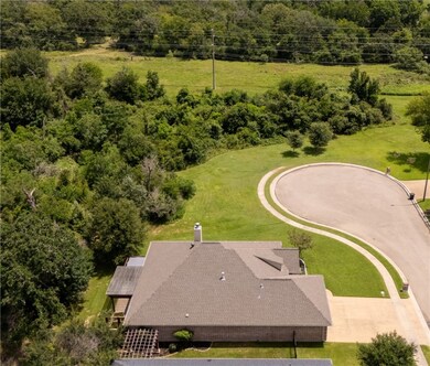 Aerial view of property and surrounding area
