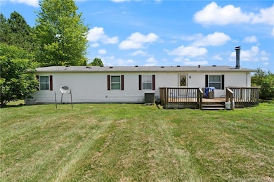 Enjoy evenings on the private back deck overlooking expansive  backyard