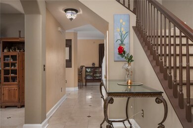 Foyer to left formal living room -straight ahead k