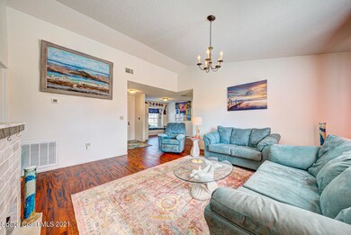 living room with chandelier