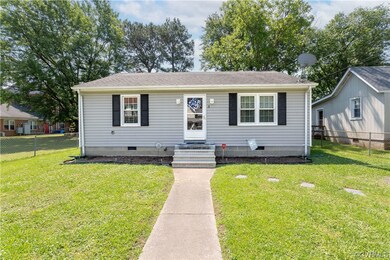 View of front of house with a front yard