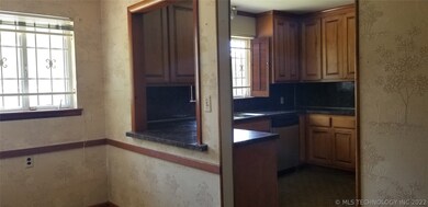 Back entry with dine-in kitchen space. Opposite si