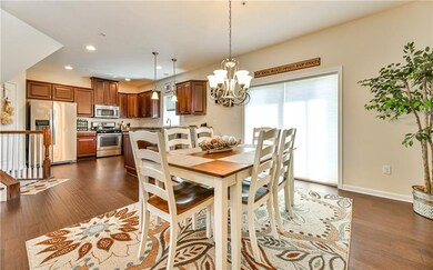 Gorgeous Hardwood Floors and Sliding Doors lead to