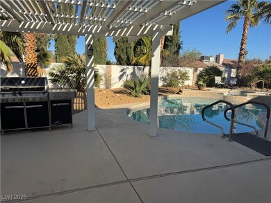 View of pool with a pergola, a fenced backyard, a