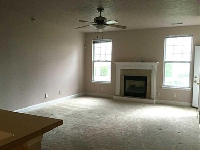 Living Room. Spacious with gas fireplace and ceili