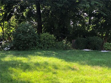 Sunny backyard with perennials and sunset views!