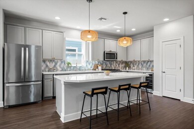 Kitchen featuring stainless steel appliances, bev