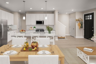 Open-concept living area alongside kitchen