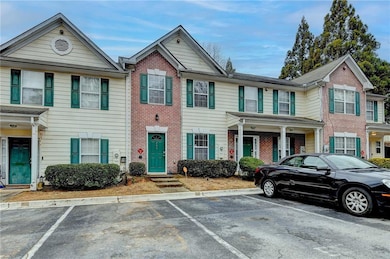Townhome / multi-family property featuring brick s