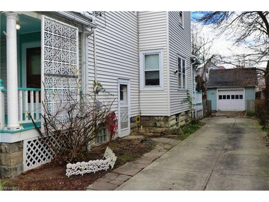 Home has 3 separate entrances, newer driveway, roof and vinyl siding!