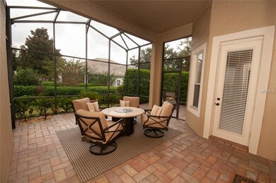 Screen enclosed covered porch with tile floors plu