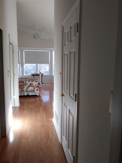 double bow window, cathedral ceiling, hardwood flo