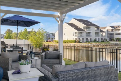 Deck with fence, an outdoor hangout area, and a re