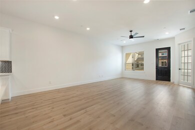 Unfurnished living room with light wood finished floors, recessed lighting, and a ceiling fan