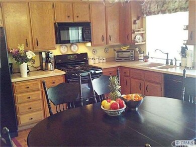 WOW.  Large family kitchen with Corian counters & 
