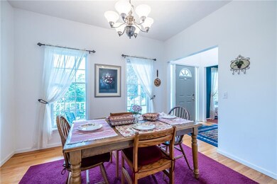 DINING ROOM RIGHT OFF THE FOYER AND KITCHEN.