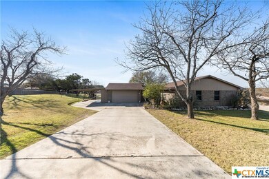 SIDE OF HOUSE
DRIVEWAY