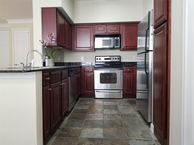 Very light and bright kitchen with slate floor, gr