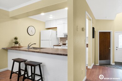 ANOTHER VIEW OF KITCHEN AREA & ENTRY
