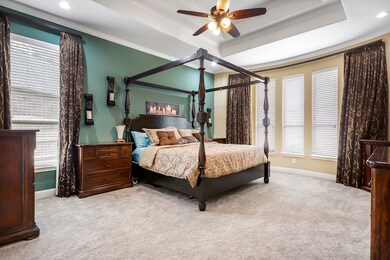 As you enter into the Primary en suite. Did I say; SPACIOUS! Has room for your large furniture and a separate seating area too. Bay window extension.