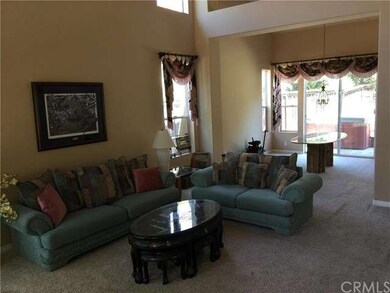 FORMAL LIVING ROOM AND DINING ROOM FROM THE FRONT 