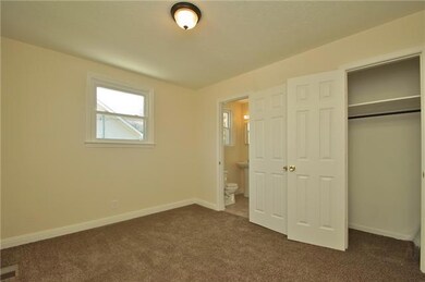 Bedroom 2 with new carpet...notice the new windows throughout!