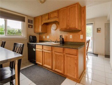 The kitchen could be opened up into the dining are