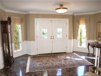 Entry/Foyer. The striking marble entry welcomes yo