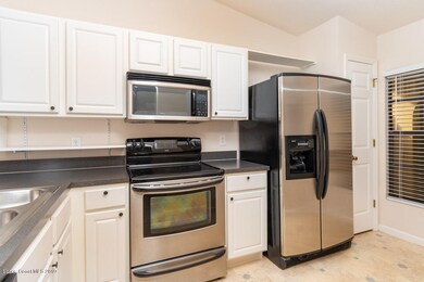 Kitchen with SS appliances.