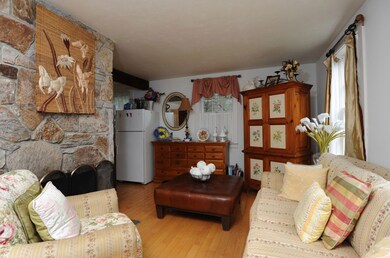Living Room with Wood-Burning Fireplace