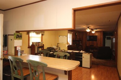 Kitchen has bar and breakfast area 